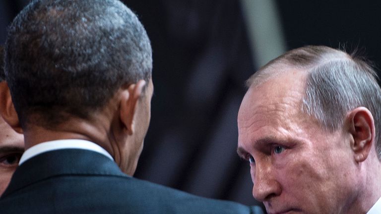 US President Barack Obama (L) and Russia&#39;s President Vladimir Putin (2nd-R) shake hands before an economic leaders meeting at the Asia-Pacific Economic Cooperation Summit at the Lima Convention Centre on November 20, 2016 in Lima. Asia-Pacific leaders are expected to send a strong message in defense of free trade as they wrap up a summit that has been overshadowed by US President-elect Donald Trump&#39;s protectionism