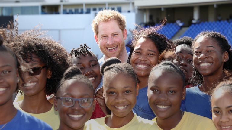 Prince Harry meets school girls as he attends a youth sports festival at Sir Vivian Richards Stadium showcasing Antigua and Barbuda&#39;s national sports, on the second day of an official visit to the Caribbean on November 21, 2016 in Antigua, Antigua and Barbuda. Prince Harry&#39;s visit to The Caribbean marks the 35th Anniversary of Independence in Antigua and Barbuda and the 50th Anniversary of Independence in Barbados and Guyana