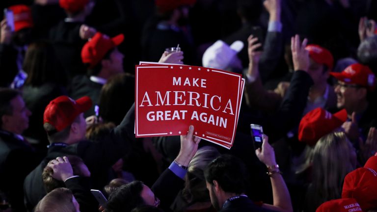 NEW YORK, NY - NOVEMBER 08: An attendee holds up a sign in support of Republican presidential nominee Donald Trump that reads 'Make America Great Again' during the election night event at the New York Hilton Midtown on November 8, 2016 in New York City. Americans today will choose between Republican presidential nominee Donald Trump and Democratic presidential nominee Hillary Clinton as they go to the polls to vote for the next president of the United States. (Phot