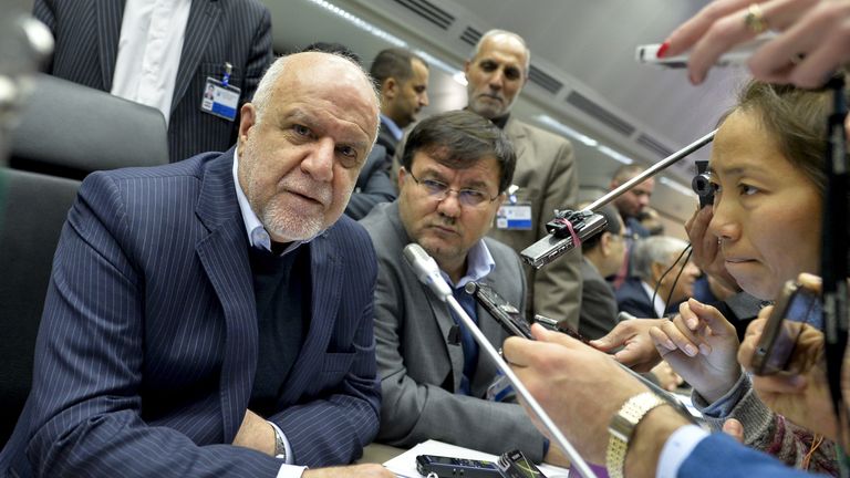 Iran&#39;s Oil Minister Bijan Zangeneh (L) talks with journalists as he attends a meeting of the Organization of the Petroleum Exporting Countries, OPEC, at the OPEC headquarters in Vienna, Austria on November 30, 2016. OPEC sought to defy expectations and finalise a deal reducing its oil output for the first time in eight years, in an effort to boost painfully low crude prices