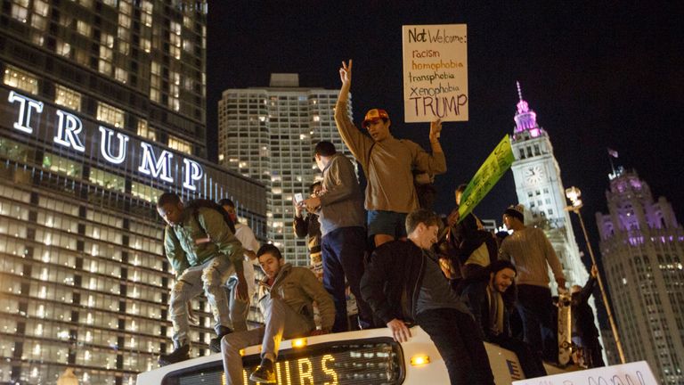 Demonstrators taking part in protests outside Trump Tower in Chicago