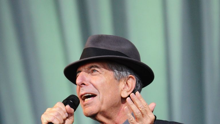 Leonard Cohen performs on  the Pyramid stage at Glastonbury in 2008