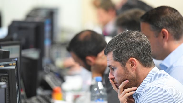 Traders at BGC Partners in London after Donald Trump's election victory 9 November