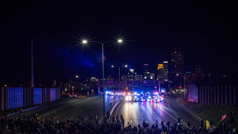 Police blocked protesters marching down the Interstate 94 in Minneapolis, Minnesota