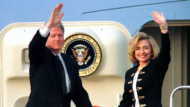 President Clinton and his First Lady wave at Tokyo's Haneda Airport in 1996 after an official visit