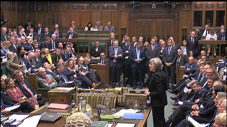Theresa May fields questions in Parliament