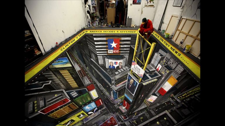 Artists making Sky News&#39; US Election 3D pavement art of Times Square in New York.