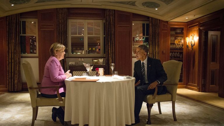German Chancellor Angela Merkel and US President Barack Obama have dinner at the Hotel Adlon in Berlin