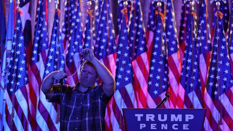 NEW YORK, NY - NOVEMBER 08: A worker prepares the teleprompter in the election night room for Republican presidential nominee Donald Trump at the New York Hilton Midtown on November 8, 2016 in New York City. Voters head to the polls to decide the next President of the United States. (Photo by Joe Raedle/Getty Images)