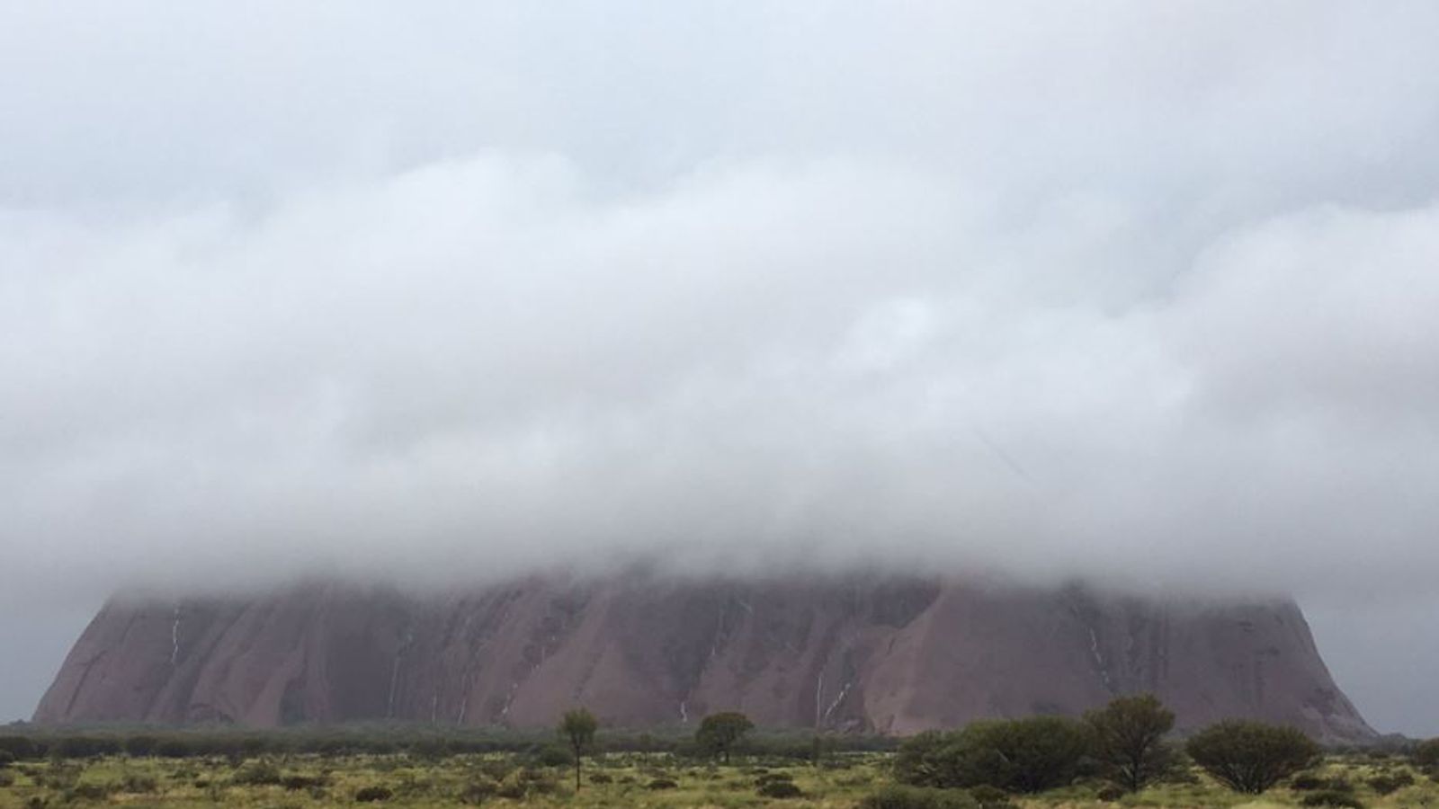 Uluru Storm Stunning waterfalls on Uluru after freak storm hits the Australian rock ...