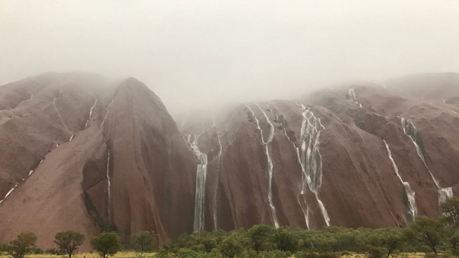 Stunning Waterfalls On Uluru After Freak Storm Hits The Australian Rock World News Sky News