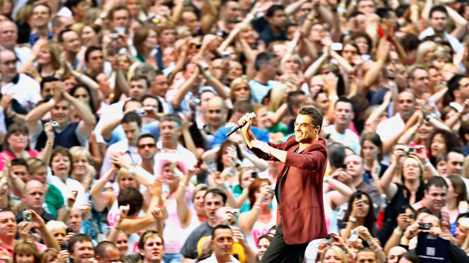 George Mic George Michael: Music icon's life in pictures | Ents & Arts News | Sky News