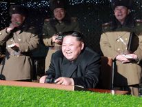 North Korean dictator Kim Jong-Un during an army combat drill - undated photo released by North Korea&#39;s official Central News Agency on 11 December 2016