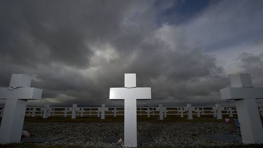 Graves in Darwin Cemetery are marked &#39;soldier known only to God&#39;