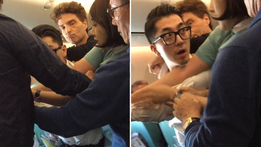 Richard Marx helps restrain a passenger on a Korean Air flight. Pic: Richard Marx/Twitter