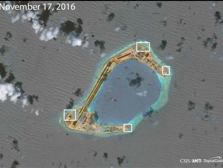 AMTI image apparently showing anti-aircraft guns on Subi Reef