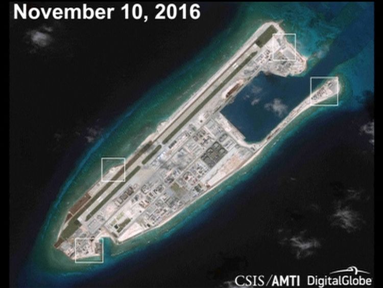 AMTI image apparently showing anti-aircraft guns on Fiery Cross Reef in the South China Sea