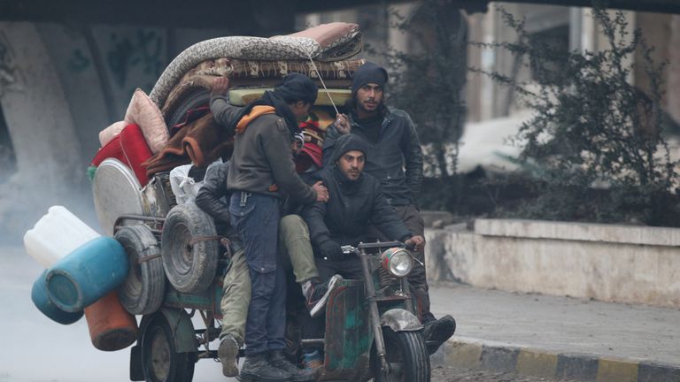 Civilians flee deeper into the remaining rebel-held areas of Aleppo