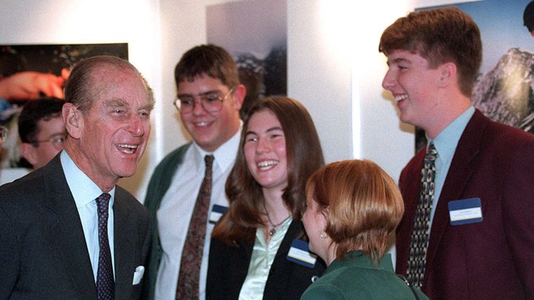 The Duke of Edinburgh shares a joke with teenagers from the North West who are taking part in the Duke of Edinburghs Award