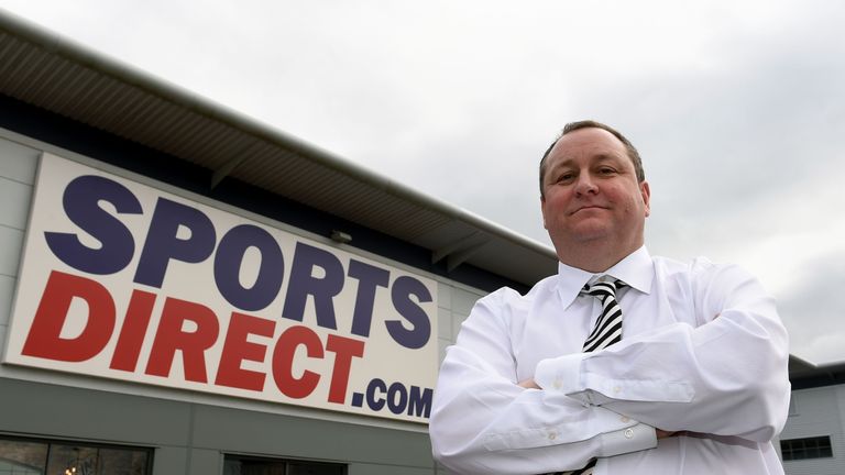 Mike Ashley outside a Sports Direct store