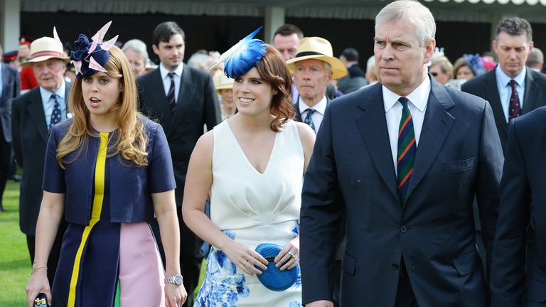 The Duke of York hosts the annual Not Forgotten Association Garden Party, accompanied by Princess Beatrice (left) and Princess Eugenie at Buckingham Palace, London