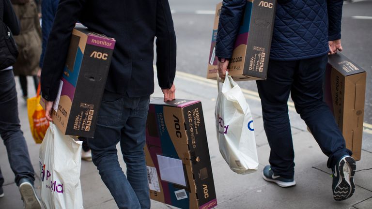Shoppers carry boxed LED monitors on Oxford Street on October 19, 2016 in London, England. Inflation rose to 1.0% in September up from 0.6% in August, according to the Office for National Statistics, hitting those on lower incomes the hardest