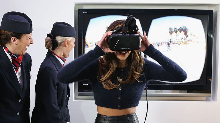 Nicole Scherzinger tries on an Oculus Rift headset