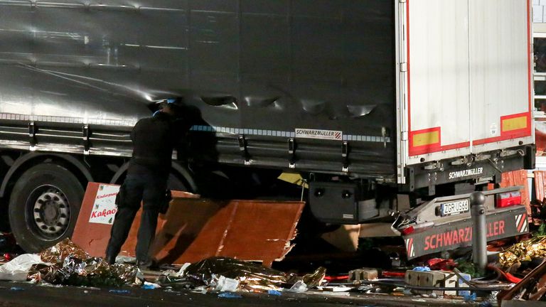 Debris lies on the floor after a lorry crashed into a Christmas market in Berlin