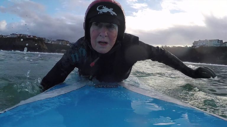 Gwyn Haslock, 71, defies expectations by catching waves nearly every time on her favourite Cornish beach