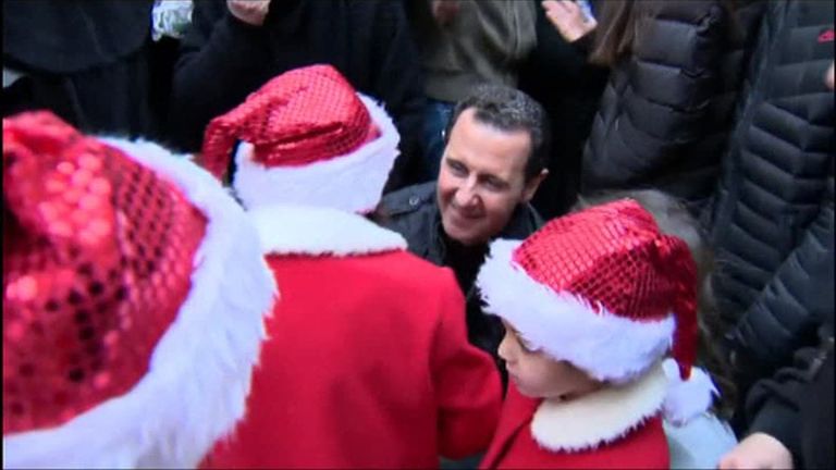 President Assad on his visit to the orphanage