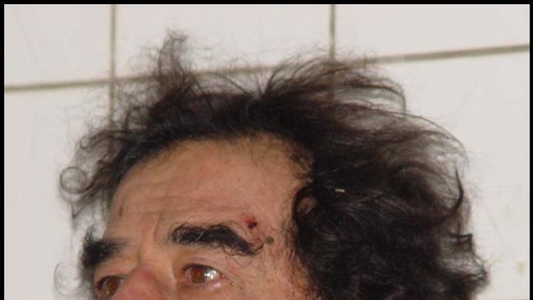 Saddam Hussein pictured after he was captured in December 2003