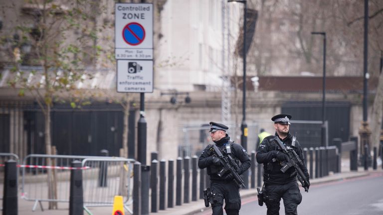 Armed police officers are patrolling central London