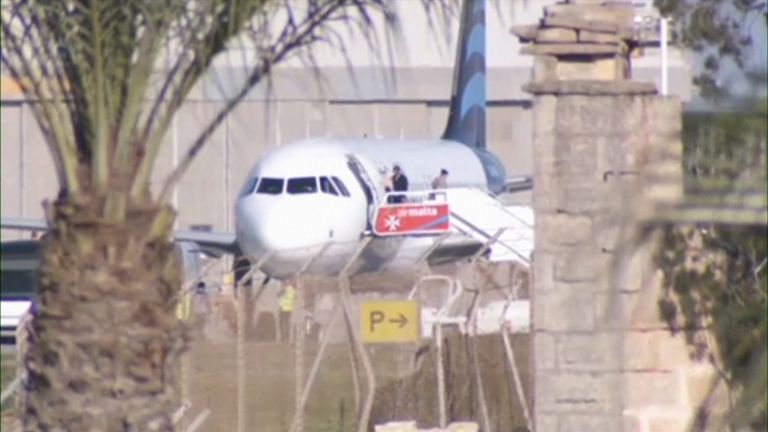 Passengers disembarking from hijacked Libyan aircraft in Malta
