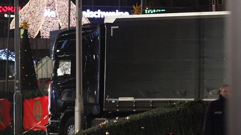 The lorry came to a stop after knocking down a Christmas tree