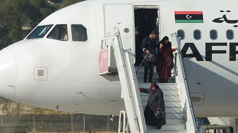 Passengers and crew are released from the hijacked aircraft in Malta.