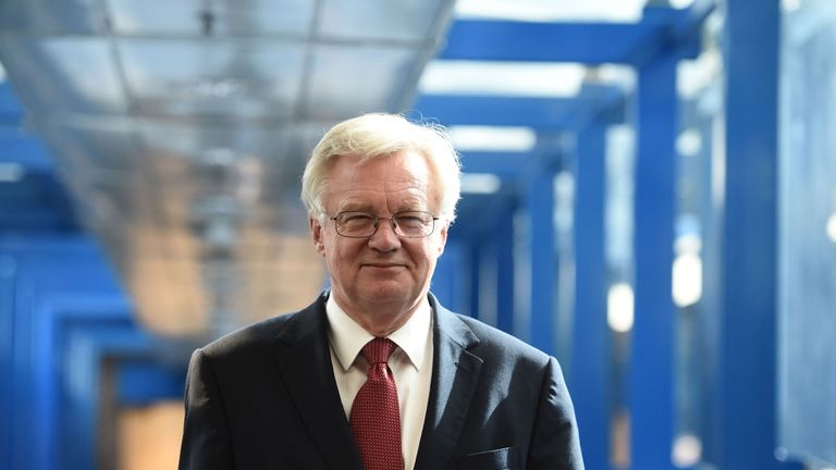 British Secretary of State for Exiting the European Union (Brexit Minister) David Davis walks along the bridge from the hotel to the International Convention Centre in Birmingham, central England, on October 2, 2016 on the first day of the Conservative party annual conference. Britain&#39;s governing Conservative Party meets for its annual conference from Sunday facing questions over how and when it will take the country out of the European Union following the Brexit vote