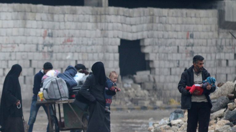 Civilians flee deeper into the remaining rebel-held areas of Aleppo