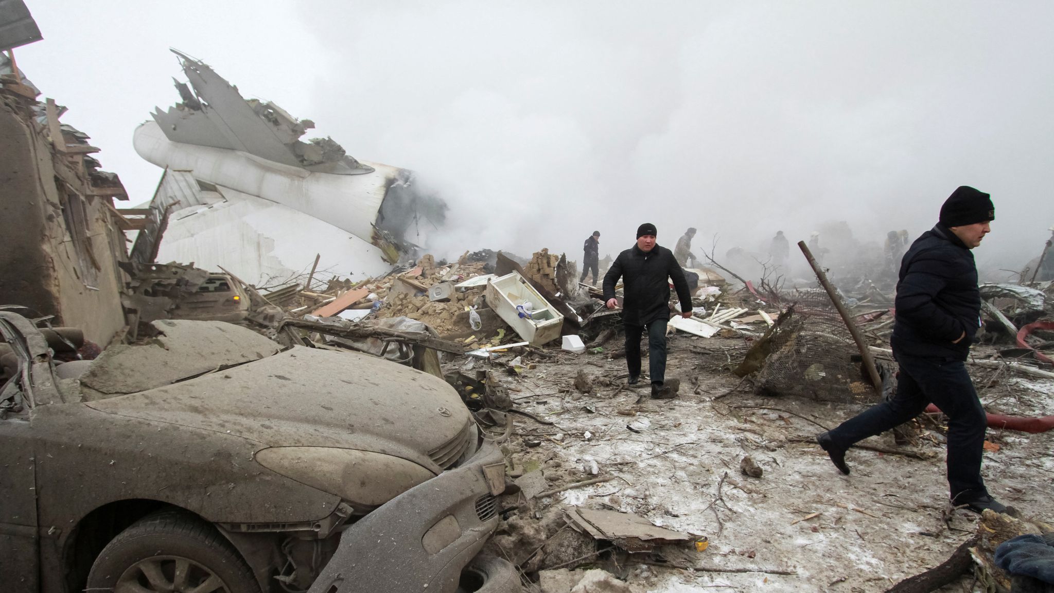 Turkish cargo jet crashes into Kyrgyzstan village, killing 37 | World ...