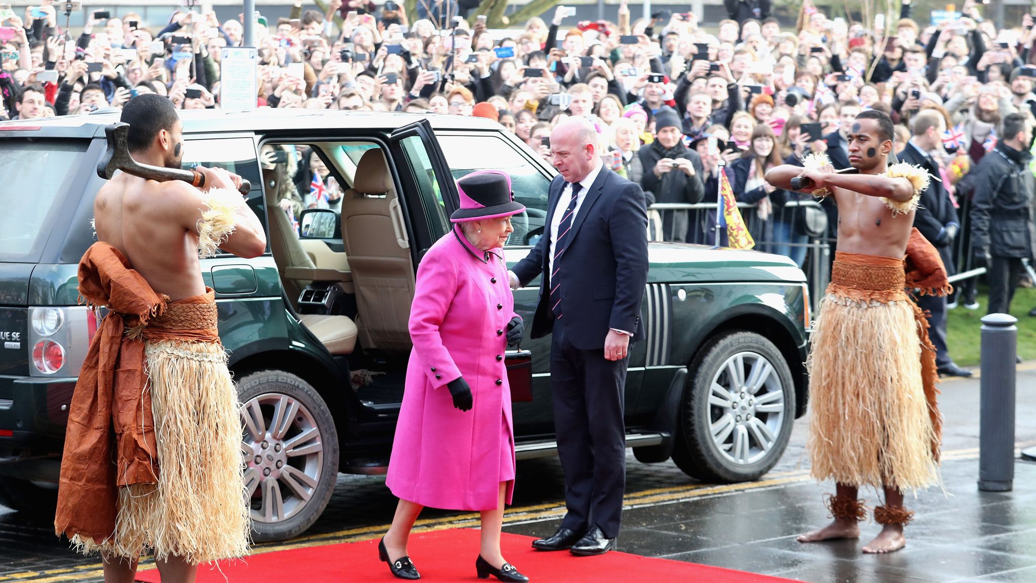Queen greeted by barechested Fijian warriors during Norwich visit UK
