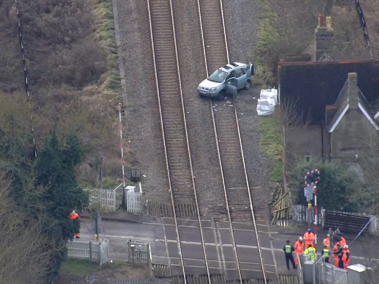 Man killed as car is hit by train at level crossing in Bedfordshire