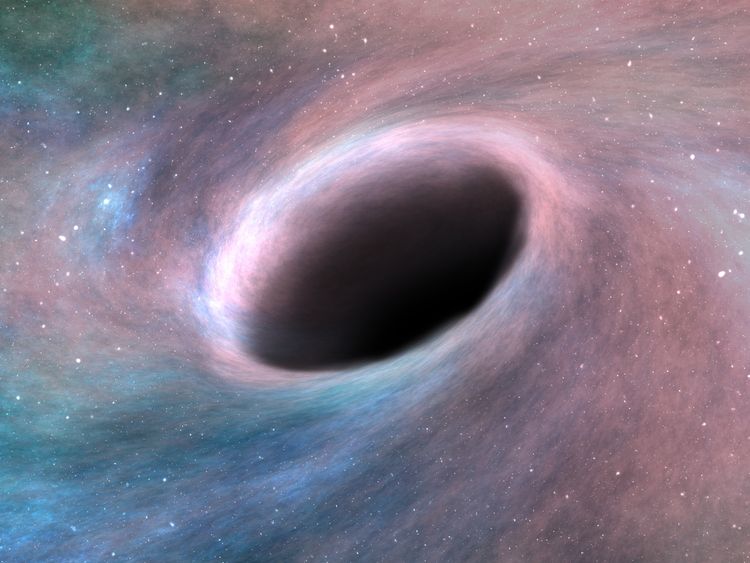 In a black hole gravity is so powerful it traps light and distorts time and space