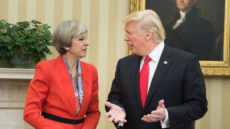 British Prime Minister Theresa May (L) and US President Donald speak in the Oval Office of the White House on January 27, 2017 in Washington, DC