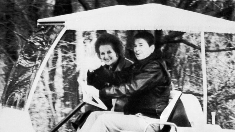 Ronald Reagan drives Margaret Thatcher toward their meeting in Camp David, 1986