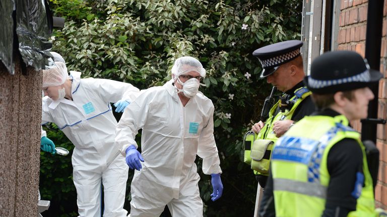 Forensic teams at a property in York in 2014