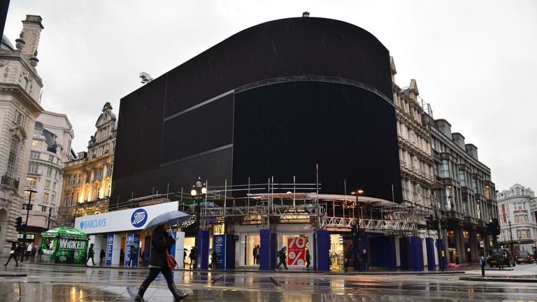 The advertising screens at Piccadilly Circus, central London, after they were switched off in preparation for redevelopment. 