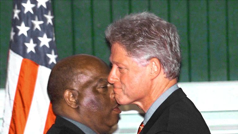 President Clinton embraces John Lewis on the 35th anniversary of march on Washington