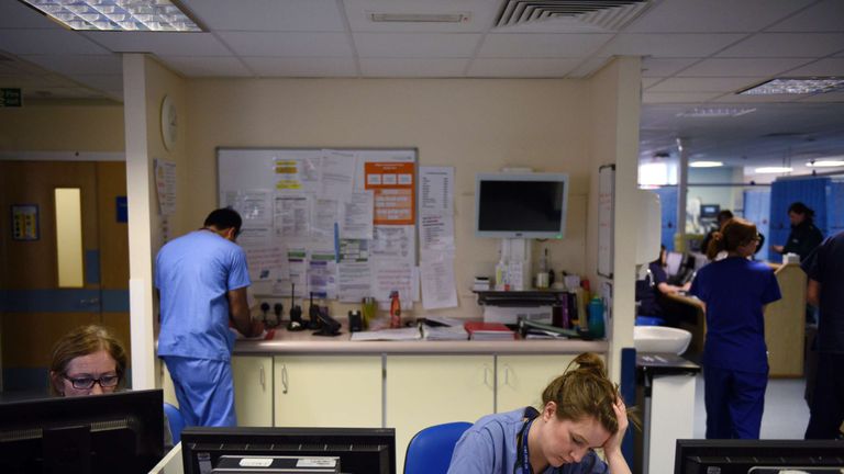 Members of clinical staff work at computers in the Accident and Emergency department of the 'Royal Albert Edward Infirmary' in Wigan, north west England on April 2, 2015