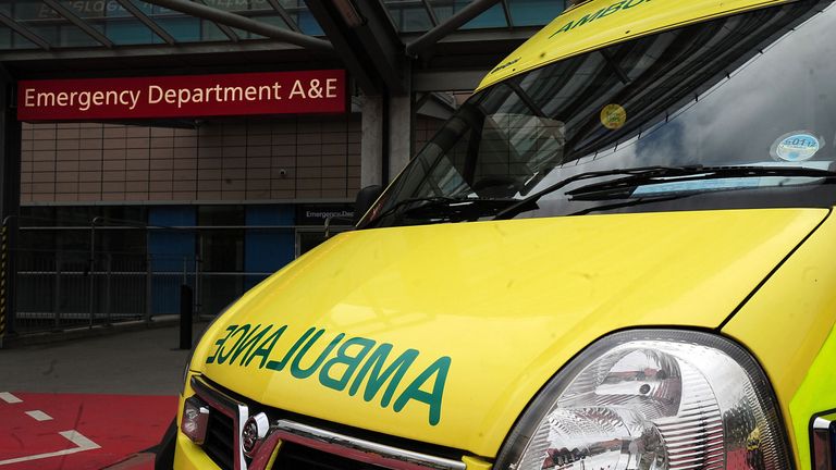 An ambulance waits outside a hospital A&E department