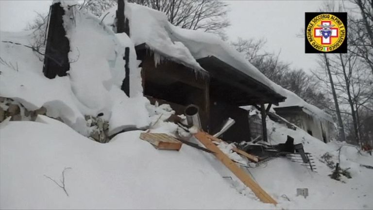 Rescue teams film inside the hotel hit by an avalanche