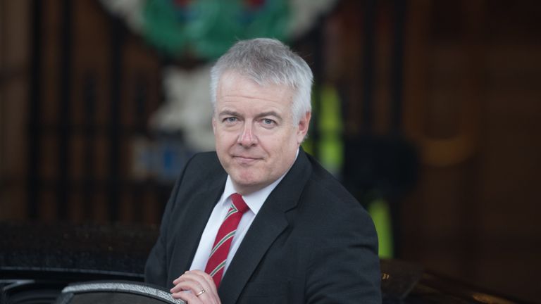 First Minister of Wales Carwyn Jones leaves Cardiff City Hall after the committee 
